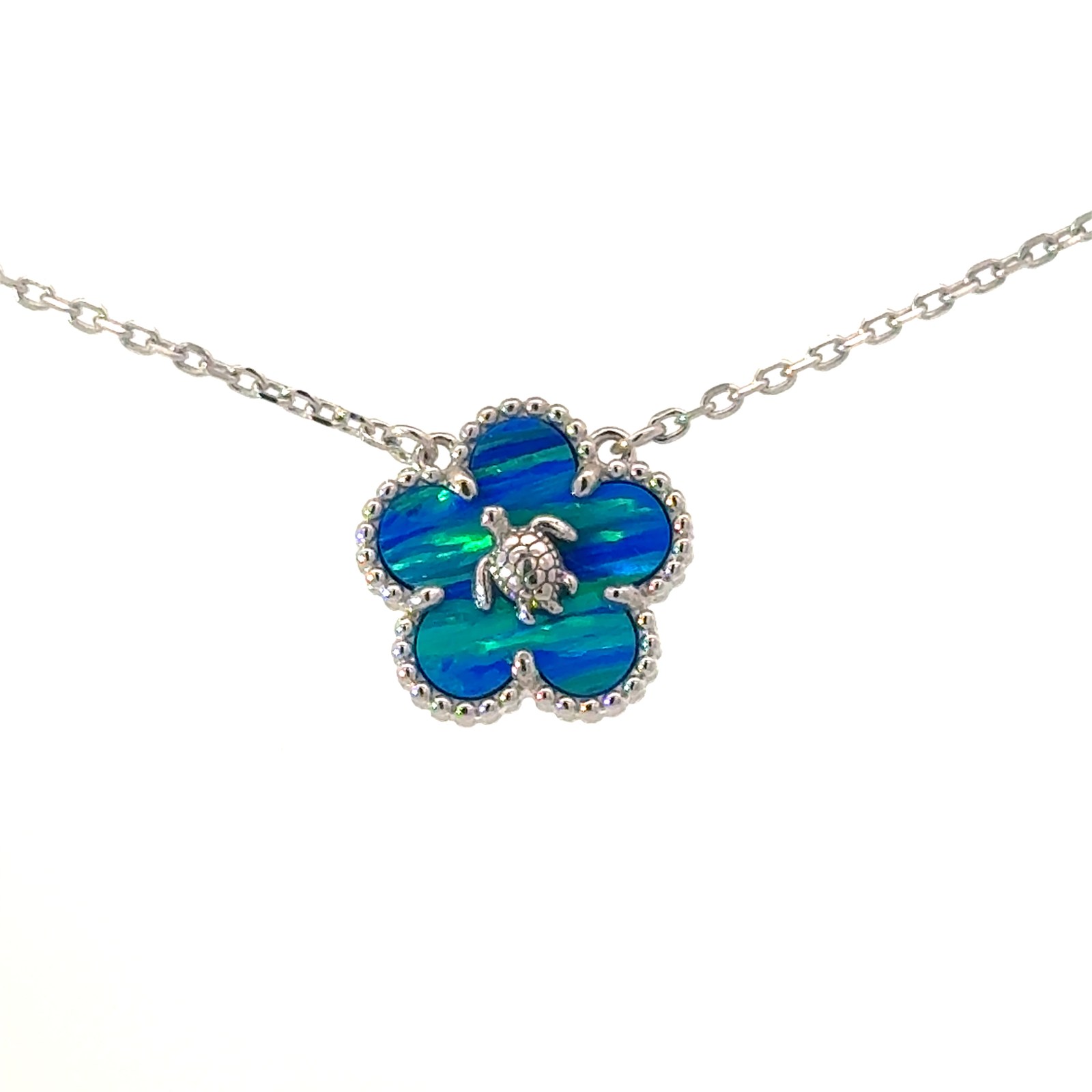 SSNOB CLT .jpg Sterling Silver rhodium plated created blue opal flower necklace with claw catch