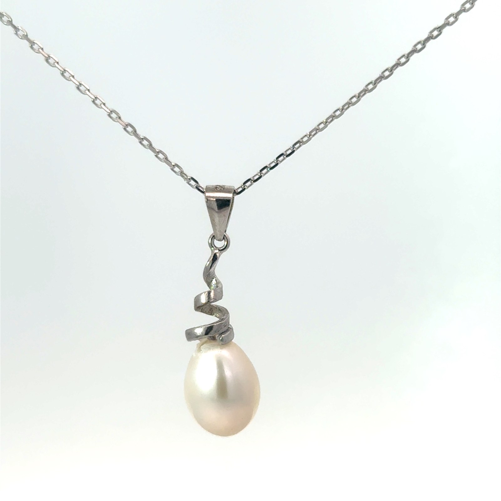 Sterling Silver rhodium plated freshwater spiral pearl necklace on 1.2mm diamond cut cable chain 18"