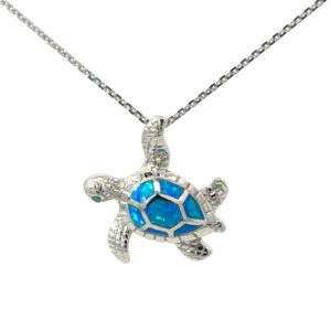 Sterling Silver rhodium plated created blue opal sea turtle pendant on 1.4mm diamond cut cable chain 18"