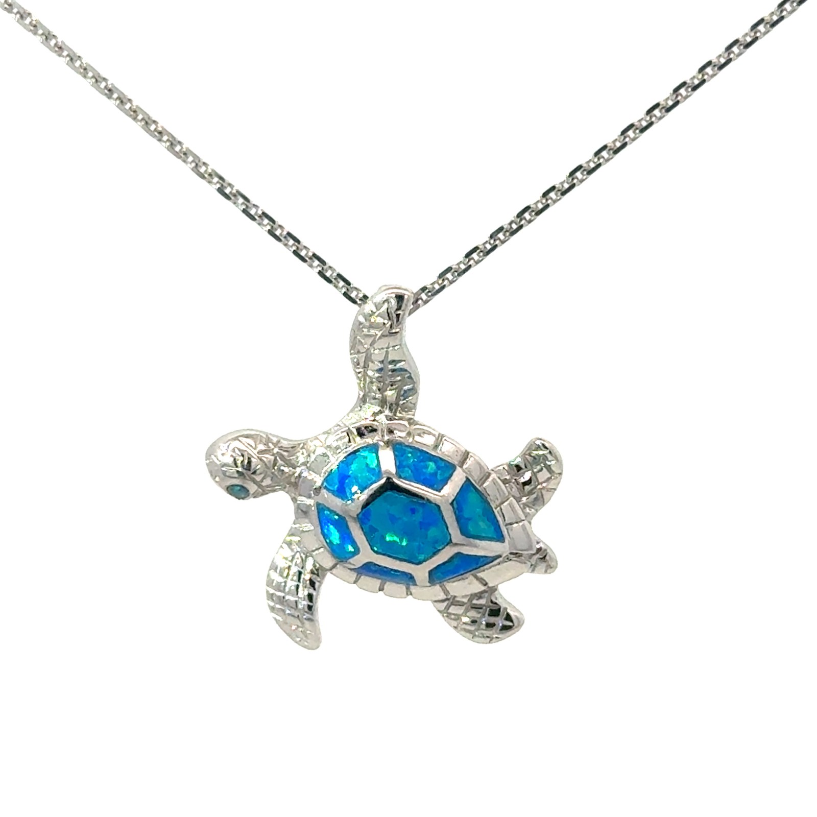 Sterling Silver rhodium plated created blue opal sea turtle pendant on 1.4mm diamond cut cable chain 18"