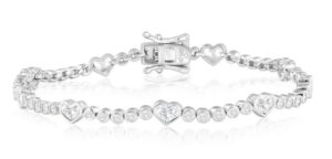 Sterling Silver rhodium plated cubic zirconia heart bezel set bracelet 7.5" with box catch and fold over safety