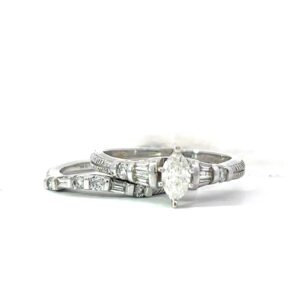 14kt w/g dia eng ring and band. Center Marquis 0.33 cts, TW 0.69 cts SI2 clarity, H color