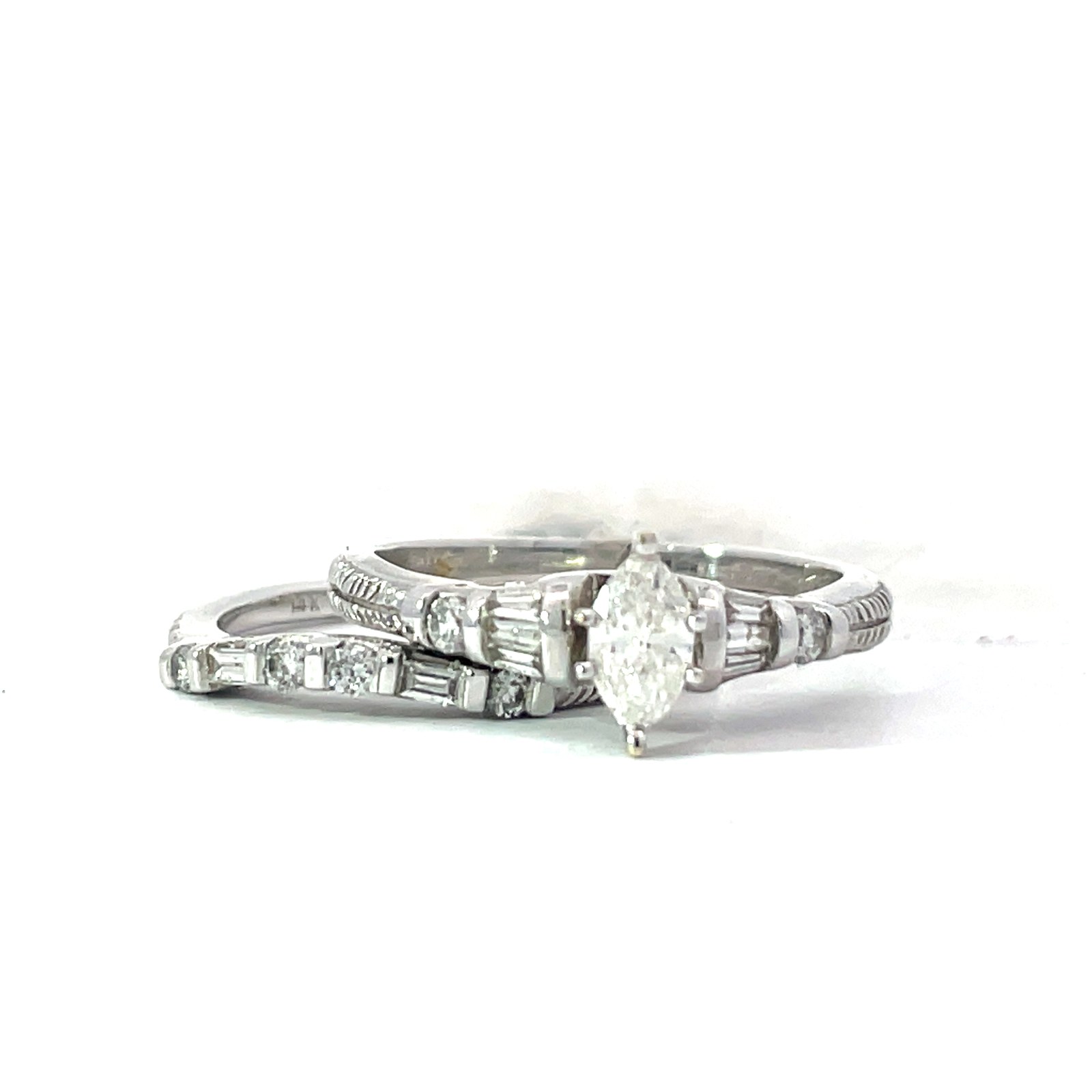 VKFS 14kt w/g dia eng ring and band. Center Marquis 0.33 cts, TW 0.69 cts SI2 clarity, H color