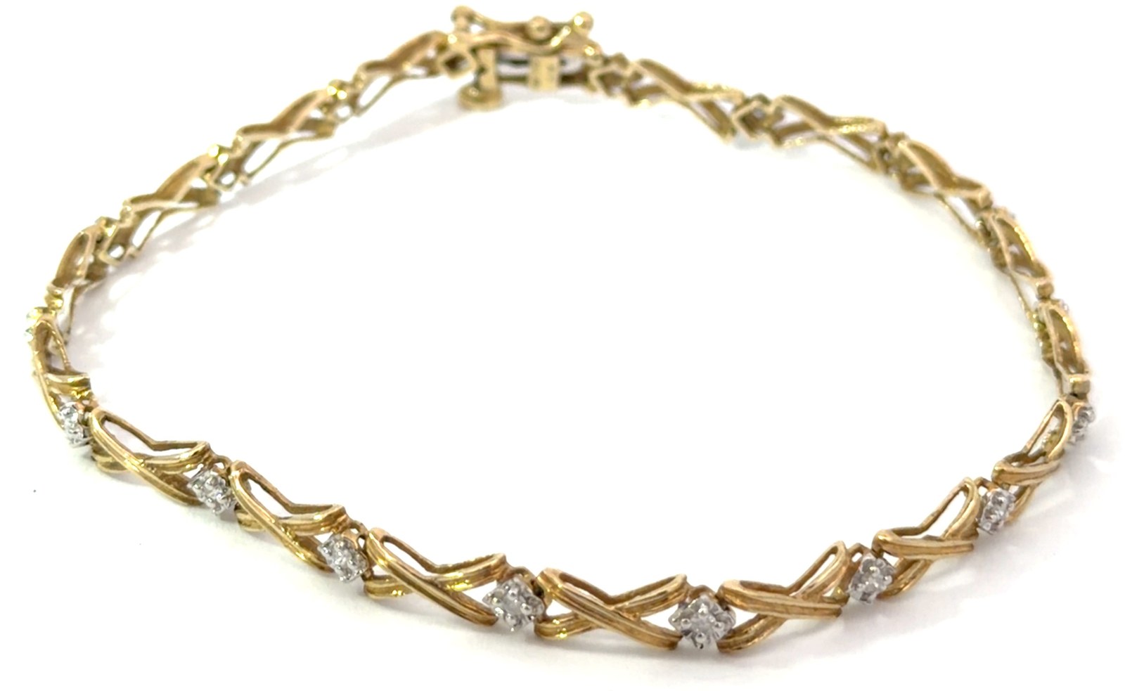 WTBS yg .jpg 10kt yellow gold diamond X tennis bracelet tw 0.20cts SI3/I1 clarity, near colorless I color with foldover safety