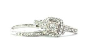10kt white gold diamnd Cushion halo illusion bridal set D tw 1/2cts. with a milgrain edge SI, H