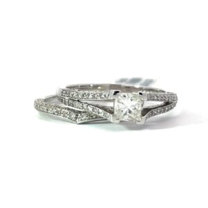 14kt w/g dia bridal set. Princess cut center 0.50 cts, 89 rd diamonds tw 0.70 cts SI clarity, I tw1.20 cts