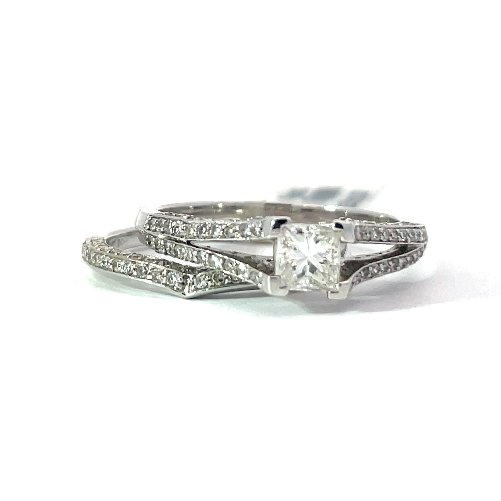 XRR 14kt w/g dia bridal set. Princess cut center 0.50 cts, 89 rd diamonds tw 0.70 cts SI clarity, I tw1.20 cts