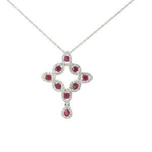 14kt white gold ruby and diamond halo fashion pendant D tw 0.30cts R tw 0.49cts SI1, near colorless G/H