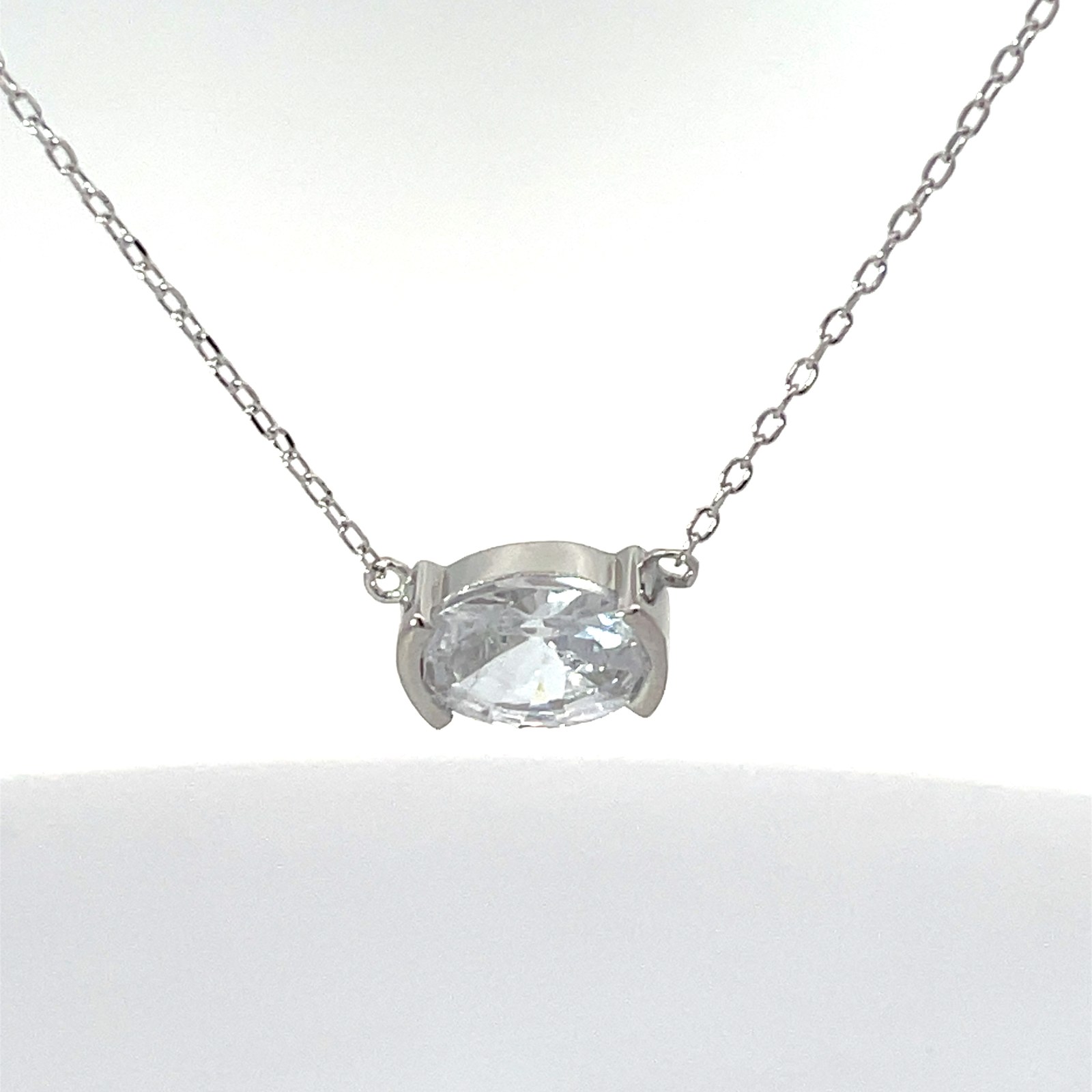 YN .jpg Sterling Silver oval cubic zirconia half bezel set solitaire neckalce