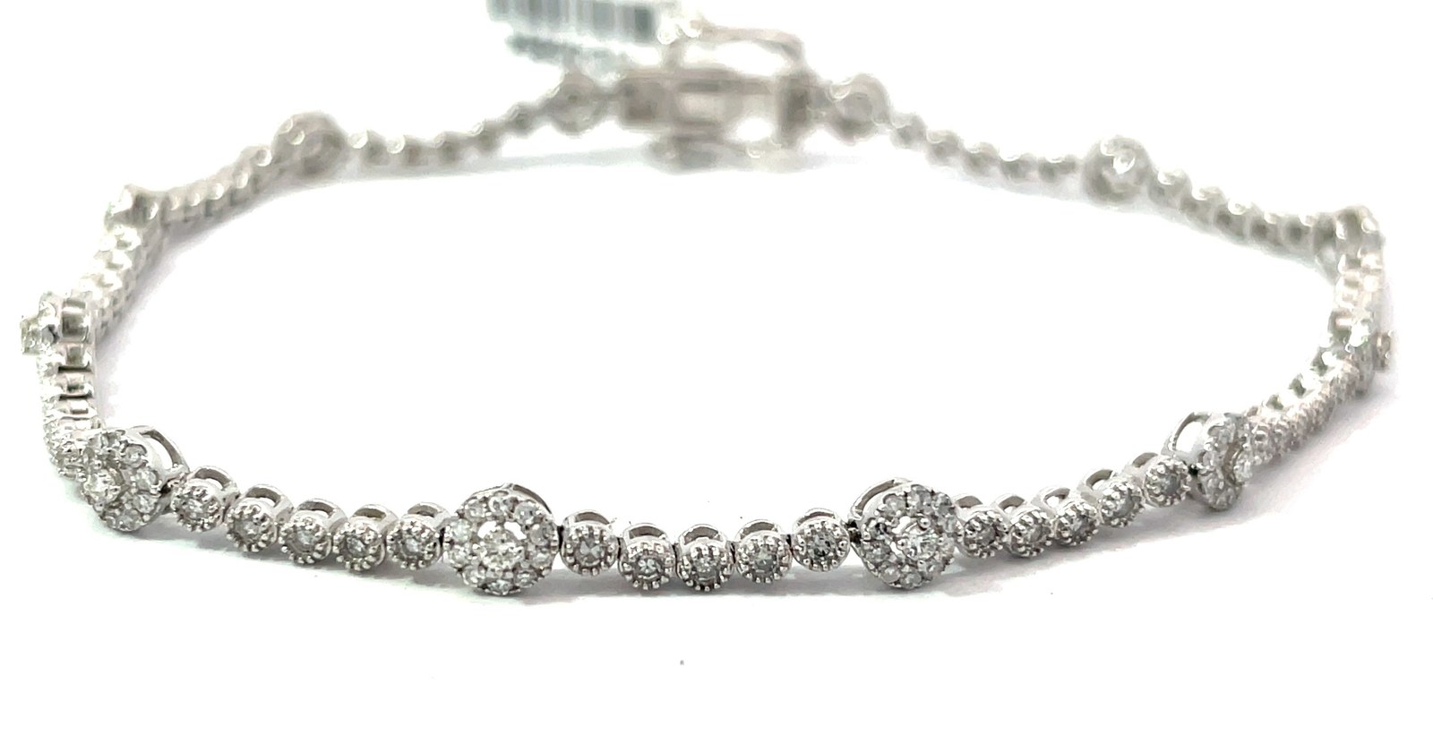 b .jpg 14kt white gold diamond cluster bracelet D tw 1.00cts with box catch and two foldovers SI, G/H