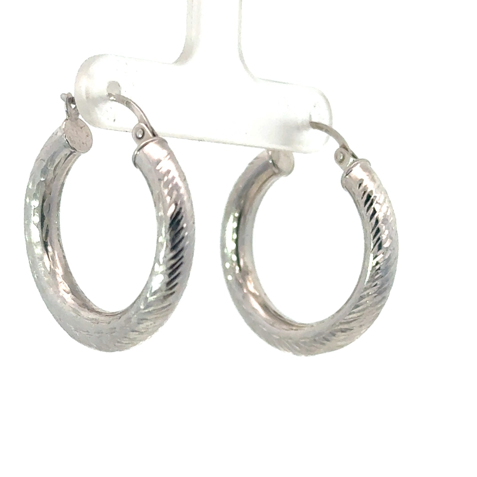 ers .jpg 14kt white gold 4 by 25mm diamond cut hoop earrings