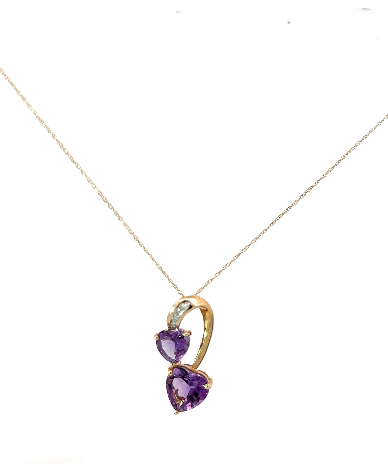 14kt yellow gold diamond and genuine heart double amethyst pendant D tw 0.04cts SI clarity, I color A tw 3.23cts on 18" machine made chain