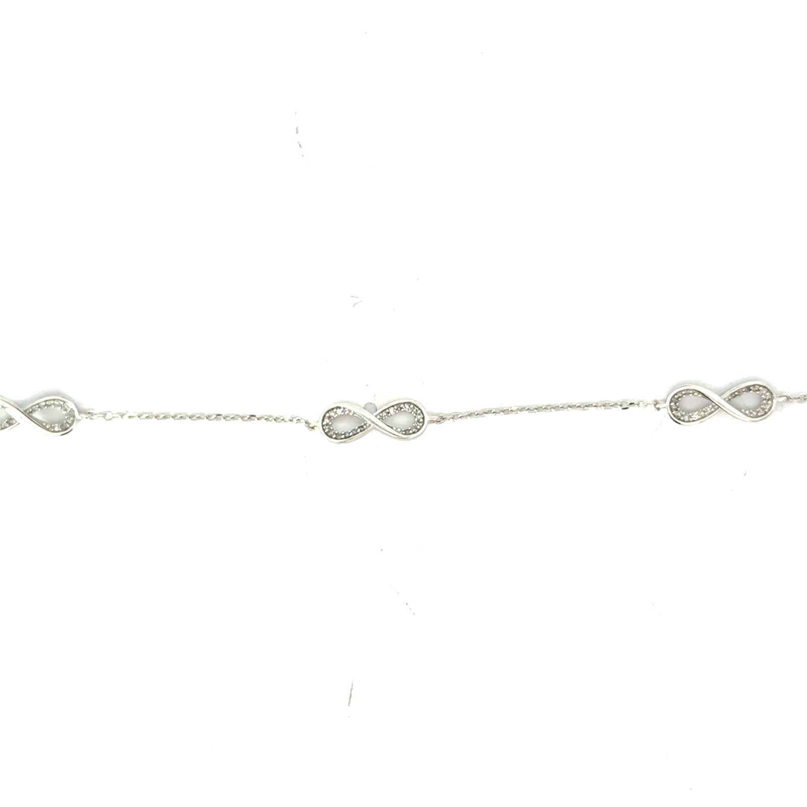 psbs .jpg 10kt white gold diamond tripple inifinity bracelet D tw 0.14cts SI clarity, near colorless I color with claw catch closure 7"