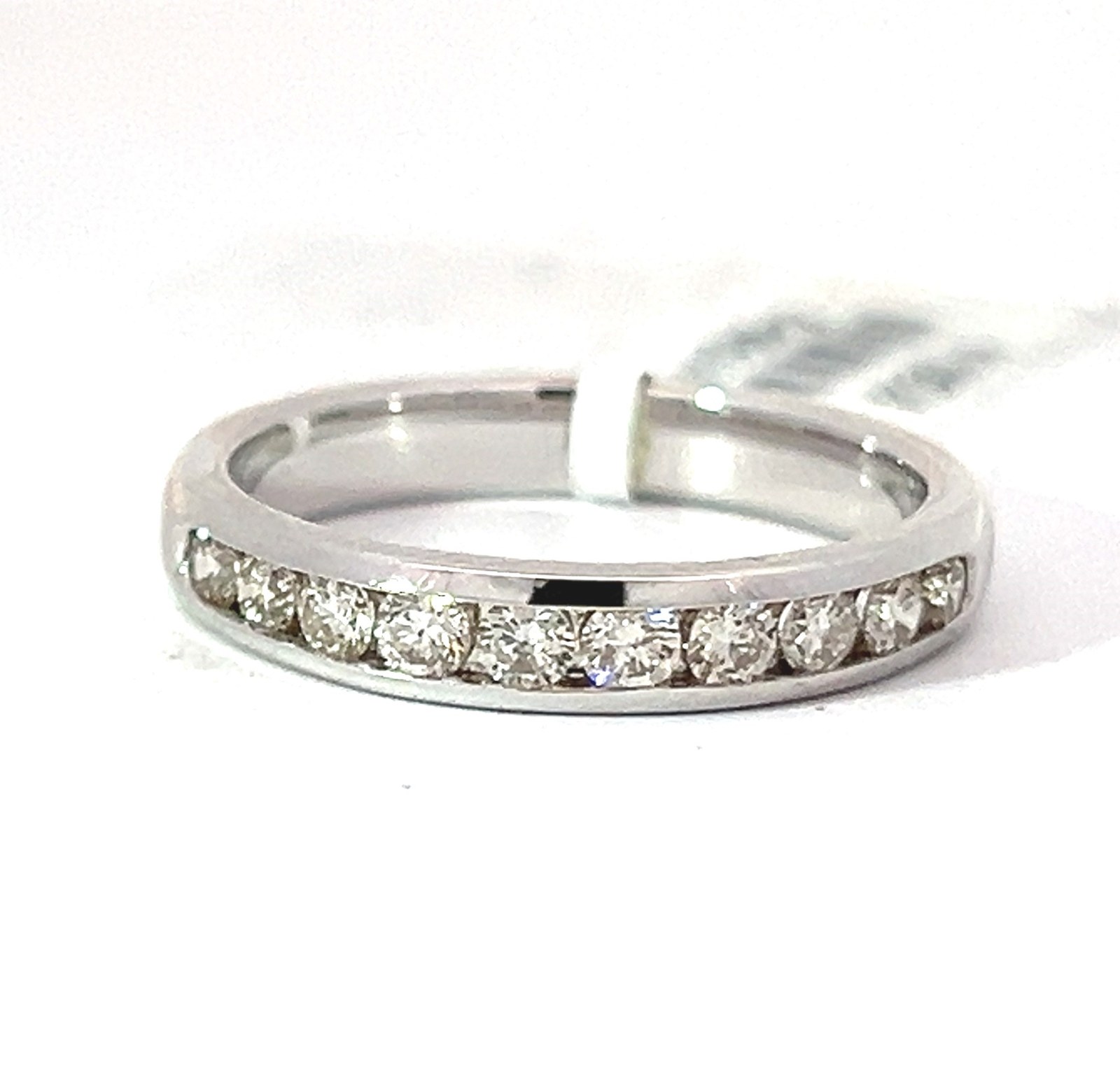 whbwc .jpg 14kt white gold diamond channel set wedding band tw 1/2ct SI, H