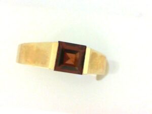 14KT Y/G GARNET RING .85PT