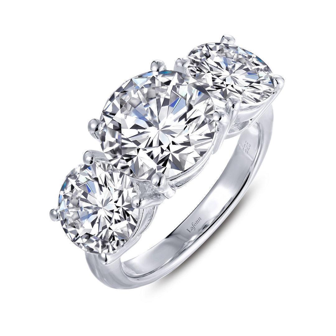 RCLP .jpg Three-stone ring is set with Lassaire simulated diamonds in sterling silver bonded with platinum tw 7.95ct size 7