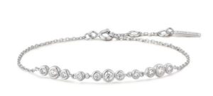 Sterling Silver rhodium plated graduated cubic zirconia bezel set trios adjustable bracelet