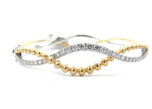 14kt two tone diamond twisted bracelet with beaded yellow gold figure eight safety D tw 1.21cts VS2/G